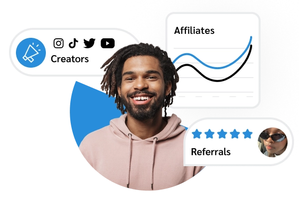 man smiling in front of blue stats